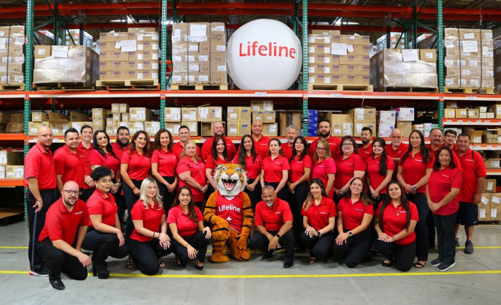 Lifeline Pharma Employees in matching red shirts